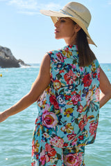 blusa flores estampado con apertura frontal sin mangas y cuello camisero