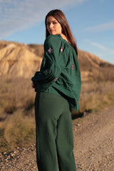 Blusa con bordo floreale