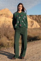 Blusa con bordo floreale