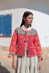 chaqueta de algodon en tonos rojo y anaranjado de manga larga