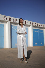 vestido blanco bordado calado en algodon de corte camisero y largo