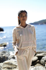 hood y pantalon rayas color beige