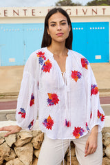 bluson blanco de algodon con bordados